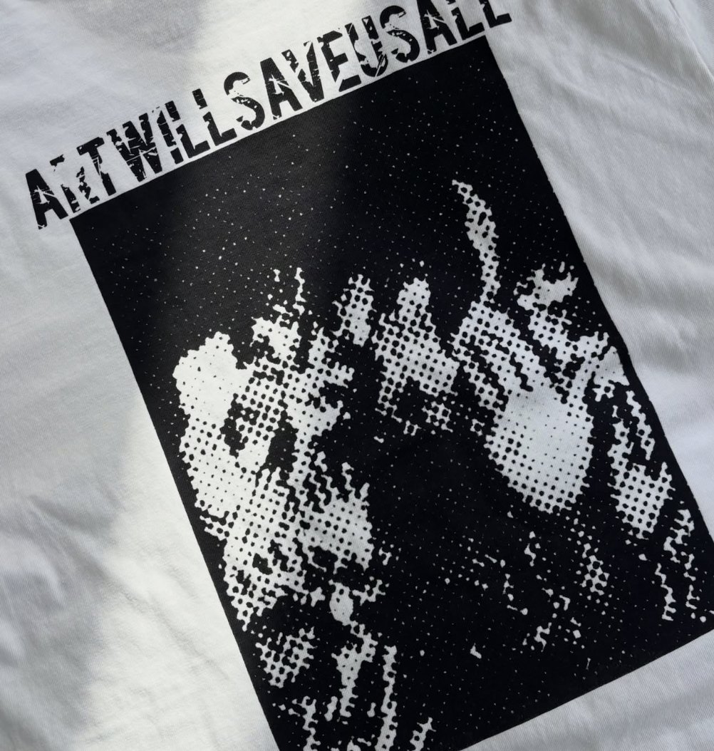 Close-up of the back print, ART WILL SAVE US ALL